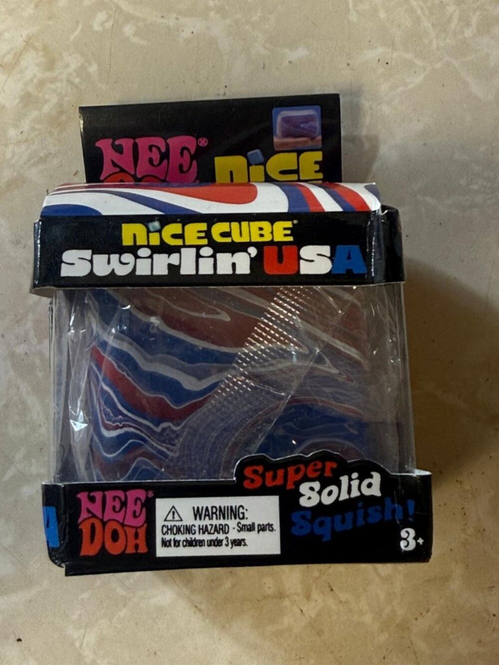 NeeDoh Nice Cube Swirlin' USA - Squish Toy - Picture 1 of 3
